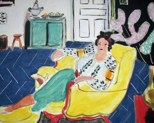 Woman sitting in an armchair by Henri Matisse